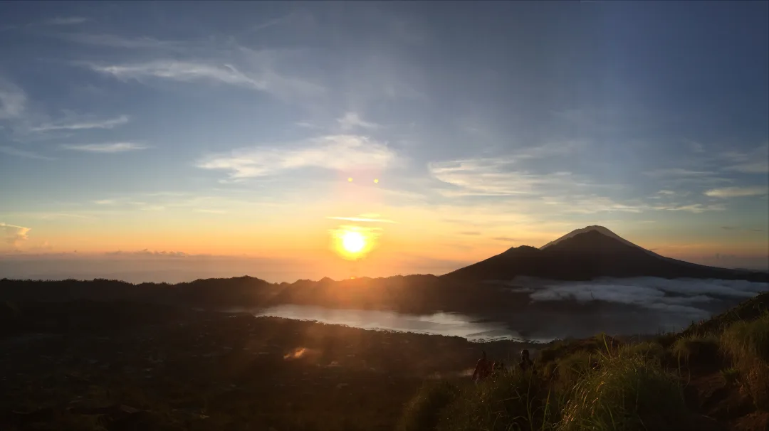 Spectacular golden sunrise from Mount Batur summit Bali