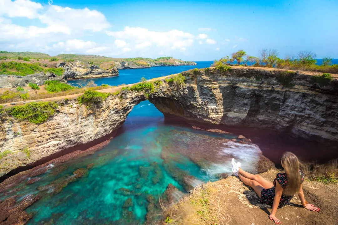 Broken Beach circular cove with natural rock archway, West Nusa Penida